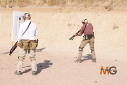 Participants wearing gear and holding a shotgun in tactical shotgun training in Colorado